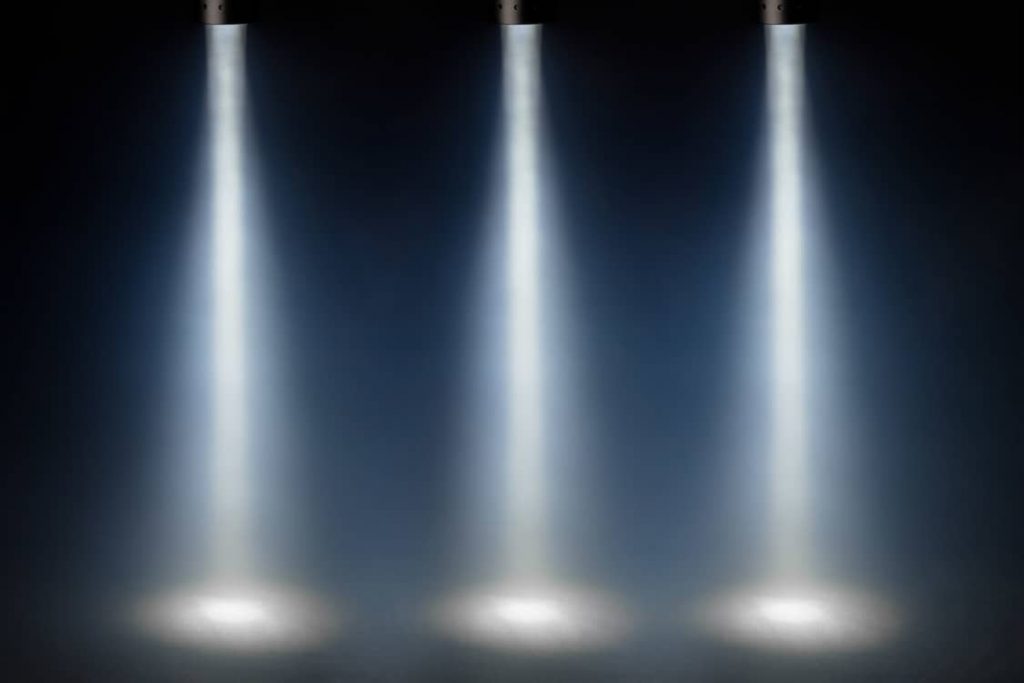 3 spotlights to emphasise the rule of three in speech writing