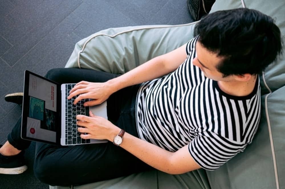 This picture depicts how the person is preparing for his presentation.