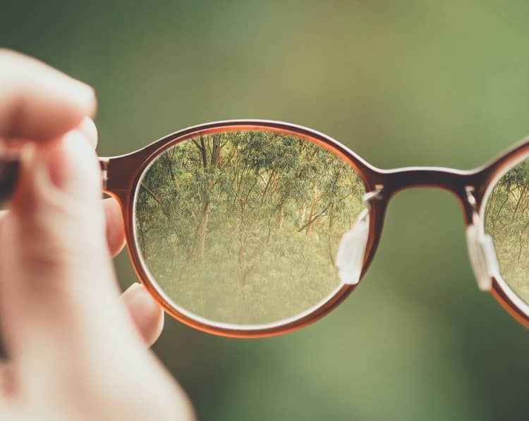 a pair of glasses showcasing seeing from a new perspective
