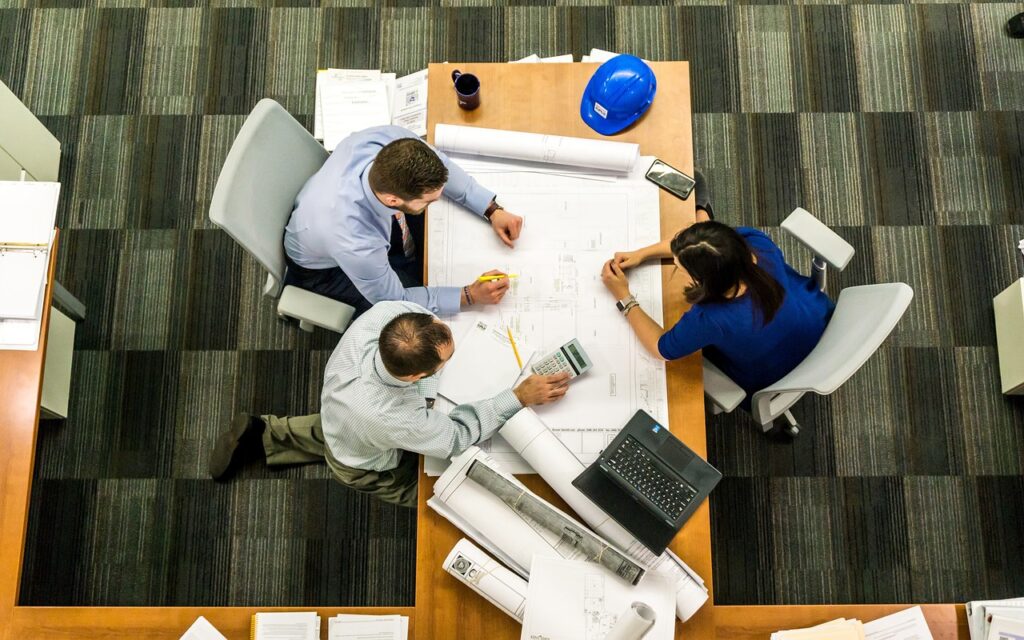 Image: Diverse team discussing in a meeting - Workplace Communication